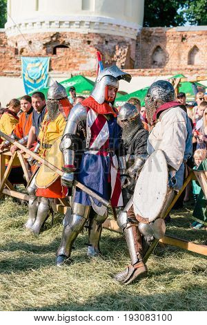 TROSTYANETS, UKRAINE - JUNE 25, 2017: Old Castle fest in action. Knights fight just beginning. This is 8 time traditional fest with historical costumes, foods and fights.