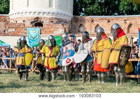 TROSTYANETS, UKRAINE - JUNE 25, 2017: Old Castle fest in action. Knights fight just beginning. This is 8 time traditional fest with historical costumes, foods and fights.