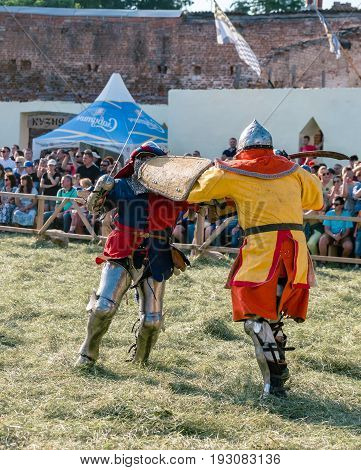 TROSTYANETS, UKRAINE - JUNE 25, 2017: Old Castle fest in action. Knights fight just beginning. This is 8 time traditional fest with historical costumes, foods and fights.