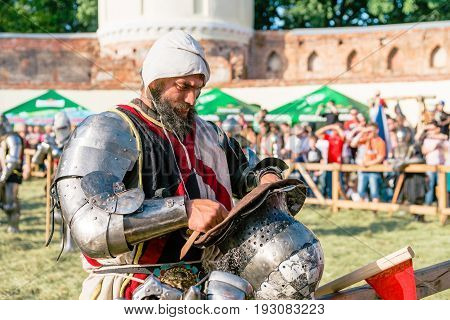 TROSTYANETS, UKRAINE - JUNE 25, 2017: Old Castle fest in action. Knights fight just beginning. This is 8 time traditional fest with historical costumes, foods and fights.