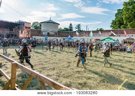 TROSTYANETS, UKRAINE - JUNE 25, 2017: Old Castle fest in action. Knights fight just beginning. This is 8 time traditional fest with historical costumes, foods and fights.