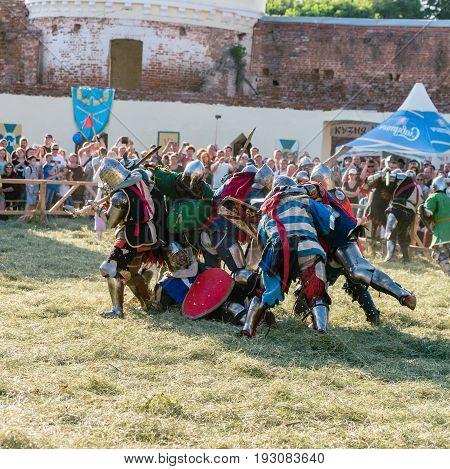 TROSTYANETS, UKRAINE - JUNE 25, 2017: Old Castle fest in action. Knights fight just beginning. This is 8 time traditional fest with historical costumes, foods and fights.