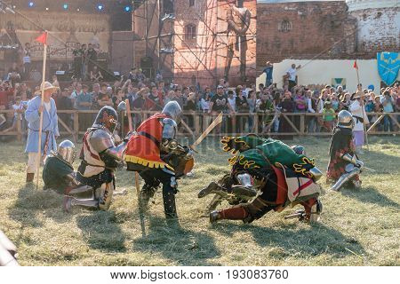 TROSTYANETS, UKRAINE - JUNE 25, 2017: Old Castle fest in action. Knights fight just beginning. This is 8 time traditional fest with historical costumes, foods and fights.