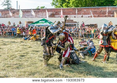 TROSTYANETS, UKRAINE - JUNE 25, 2017: Old Castle fest in action. Knights fight just beginning. This is 8 time traditional fest with historical costumes, foods and fights.