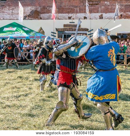 TROSTYANETS, UKRAINE - JUNE 25, 2017: Old Castle fest in action. Knights fight just beginning. This is 8 time traditional fest with historical costumes, foods and fights.