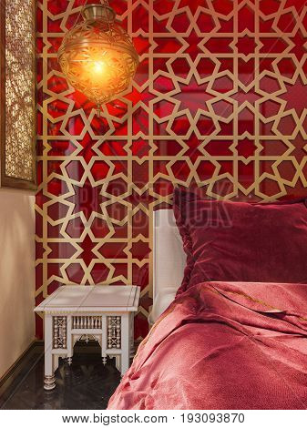 3d illustration bedroom interior design of a hotel room in a traditional Islamic style. Beautiful deluxe room Ramdan Kareem background interior view decorated with Islamic motifs.