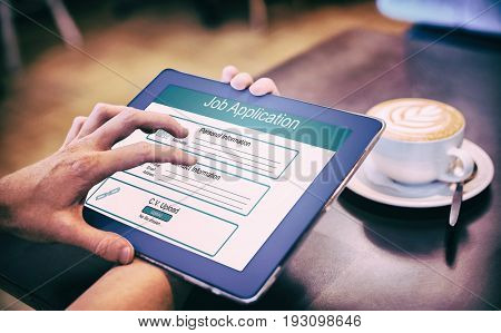Digitally generated image of Job Application  against  close-up of digital tablet and coffee on table Close-up of digital tablet and coffee on table in the coffee shop