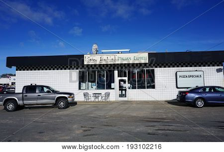 BAY VIEW, MICHIGAN / UNITED STATES - NOVEMBER 26, 2016: One may eat pizza, and other Italian food, at Spicy Bob's Italian Express restaurant.