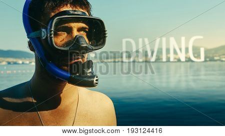 Diving, Inscription on the background of a portrait of a diver with a mask and snorkel. The concept of freediving, tourism and travel