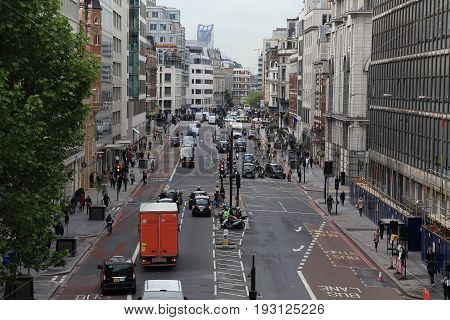 LONDON, GREAT BRITAIN - MAY 13, 2014: This is the urban traffic in Farrington Street in the morning.