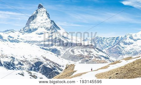 ZERMATT, SWITZERLAND - May 16. 2017: Matterhorn Mountain with white snow and blue sky in Zermatt city in Switzerland