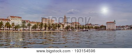 Daytime panoramic view on Riva waterfront, houses and Cathedral of Saint Domnius, Dujam, Duje, bell tower in old town, Split, Croatia
