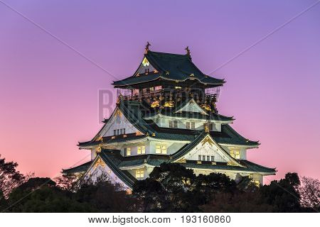 Osaka Castle in evening sun light in autumn Osaka Japan