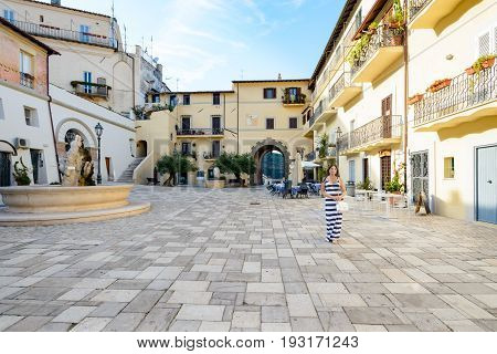 Nice girl posing in a little town called Circeo near Rome