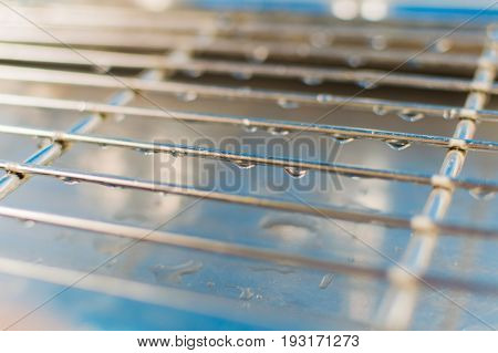 Drops of drinking water on grids of lattice
