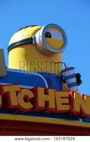 OSAKA, JAPAN - June 24, 2017 : Statue of "HAPPY MINION", located in Universal Studios Japan, Osaka, Japan. Minions are famous character from Despicable Me animation.