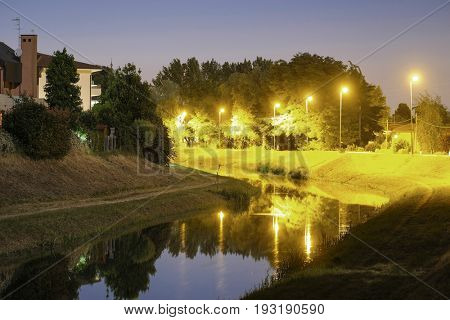 night landscape with the image of channel in Rovigo, Italy