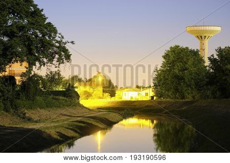 night landscape with the image of channel in Rovigo, Italy