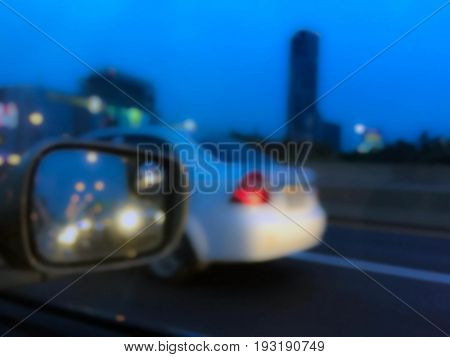 Blurry car mirror background on road hi-way