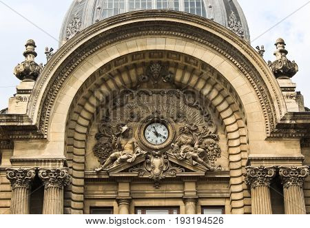 The CEC Palace build in 1900 in Bucharest, Romania. Dome with clock details.