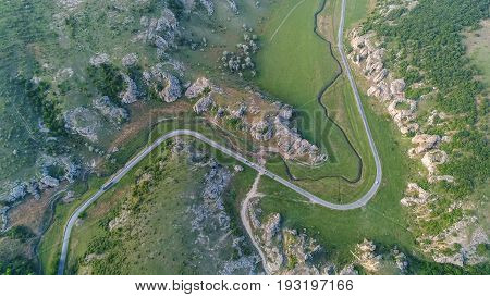 mountain landscape with some of the oldest limestone rock formations in Europe in Dobrogea Gorges (Cheile Dobrogei) Romania