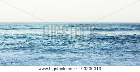 Waves of blue quiet ocean coast landscape. Background sea scape and sand beach coastline. Panorama horizon perspective view nature hiliday. Travel summer concept backdrop water seascape mock up