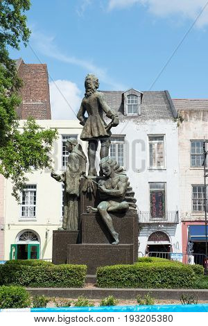 NEW ORLEANS, LA - APRIL 13: View of Street in the French Quarter of New Orleans, Louisiana showing historic buldings with unique architecture on April 13, 2014