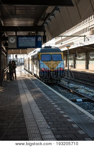 MAASTRICHT NETHERLANDS - JANUARY 17 2016: A passenger train. The main railway station. Railway transport of the Netherlands.
