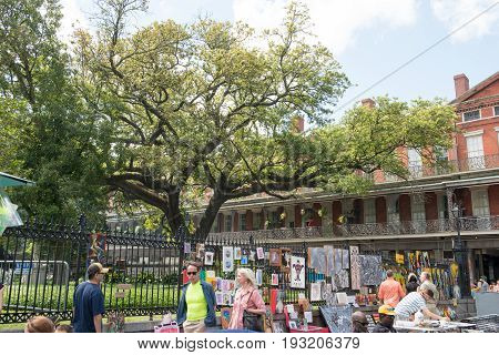 NEW ORLEANS, LA - APRIL 13: View of Street in the French Quarter of New Orleans, Louisiana showing historic buldings with unique architecture on April 13, 2014