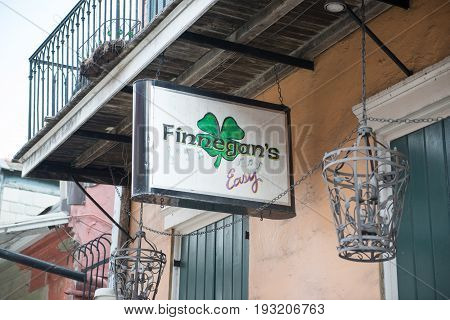 NEW ORLEANS, LA - APRIL 13: View of Street in the French Quarter of New Orleans, Louisiana showing historic buldings with unique architecture on April 13, 2014