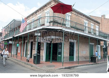NEW ORLEANS, LA - APRIL 13: View of Street in the French Quarter of New Orleans, Louisiana showing historic buldings with unique architecture on April 13, 2014
