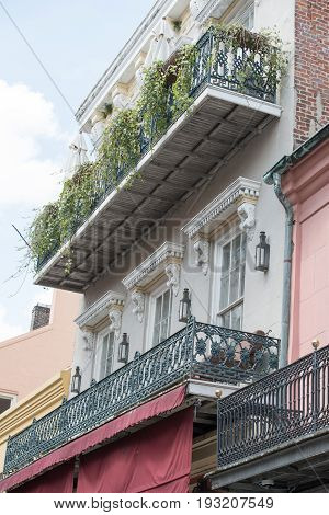 NEW ORLEANS, LA - APRIL 13: View of Street in the French Quarter of New Orleans, Louisiana showing historic buldings with unique architecture on April 13, 2014