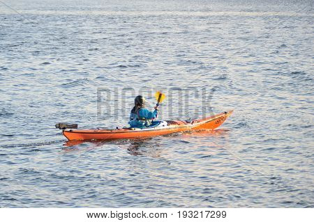 Galway Spanish Arch , Ireland June 2017,river Corrib , Girl Sailing A Kayak.
