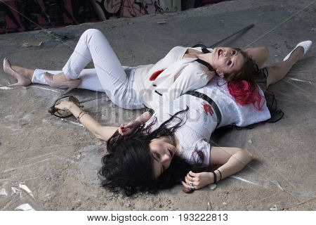 Crime Scene With Two Fashionable Women  In A Darkplace