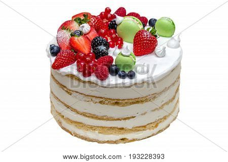 Cake with fruits and macarons isolated on white background