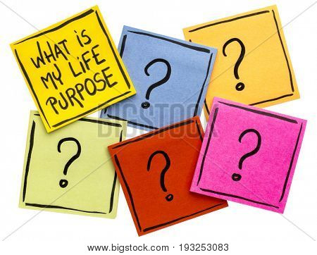 What is my life purpose?  Handwriting on isolated sticky notes with multiple question marks