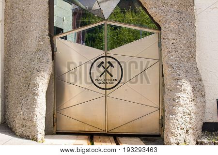 Bad Gastein Austria - JUNE 09 2017: Entrance for the railway into the mountain. At the health Resort Paselstollen a former Gold mining tunnel Bad Gastein Austria Europe.