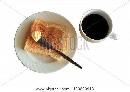 Breakfast plate of toast with butter and cup of black coffee isolated on white background with clipping path.