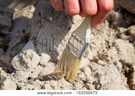 Archaeological find - a fragment of ancent ceramic vessel , sharpness on the find