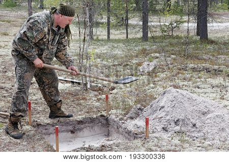 Rough stripping of the soil layer in the excavation - the stage of archaeological work