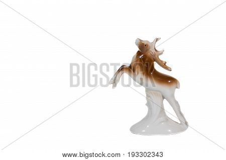 Deer. Porcelain figurine of deer isolated on white background.
