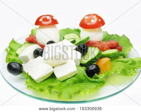 creative vegetable salad with mushrooms made of egg and tomato