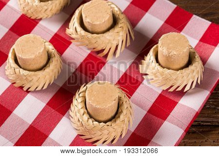 Pacoca - Brazilian Candy Of Ground Peanut With Wicker Hat Of Festivity Festa Junina Decoration.