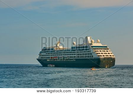Cruise Ship came to Amalfi in Southern Italy. Aerial view.