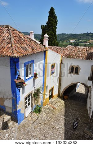 In The Streets Of The Picturesque Town Of Obidos, Portugal
