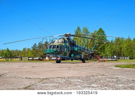 Multipurpose helicopter Mi-8 MT at the airfield in Pushkin during the festive Airshow. Helicopter in camouflage coloring.