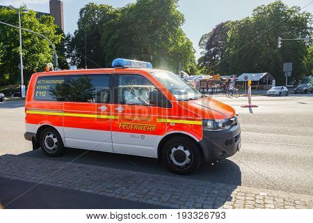 KIEL / GERMANY - JUNE 20 2017: german emergency doctor car from fire department drives on a street.