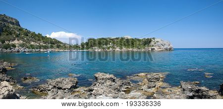 Panoramic view of clean sea at bay of Ladiko on greek island Rhodes