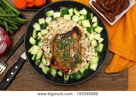Pork Chop and Honey-Mustard Pan Sauce with green beans, carrots, apricot barley crisp, cranberry juice, marinated cucumber salad, creamy barley salad.