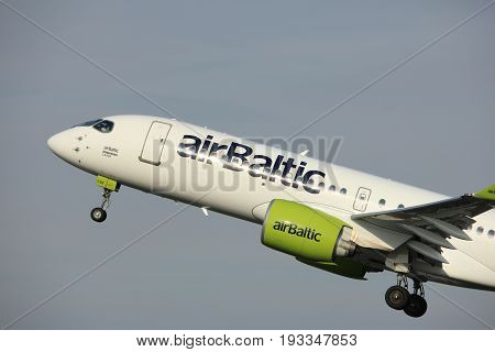 Amsterdam the Netherlands - June 2nd 2017: YL-CSB Air Baltic Bombardier BD-500 taking off from Polderbaan Runway Amsterdam Airport Schiphol